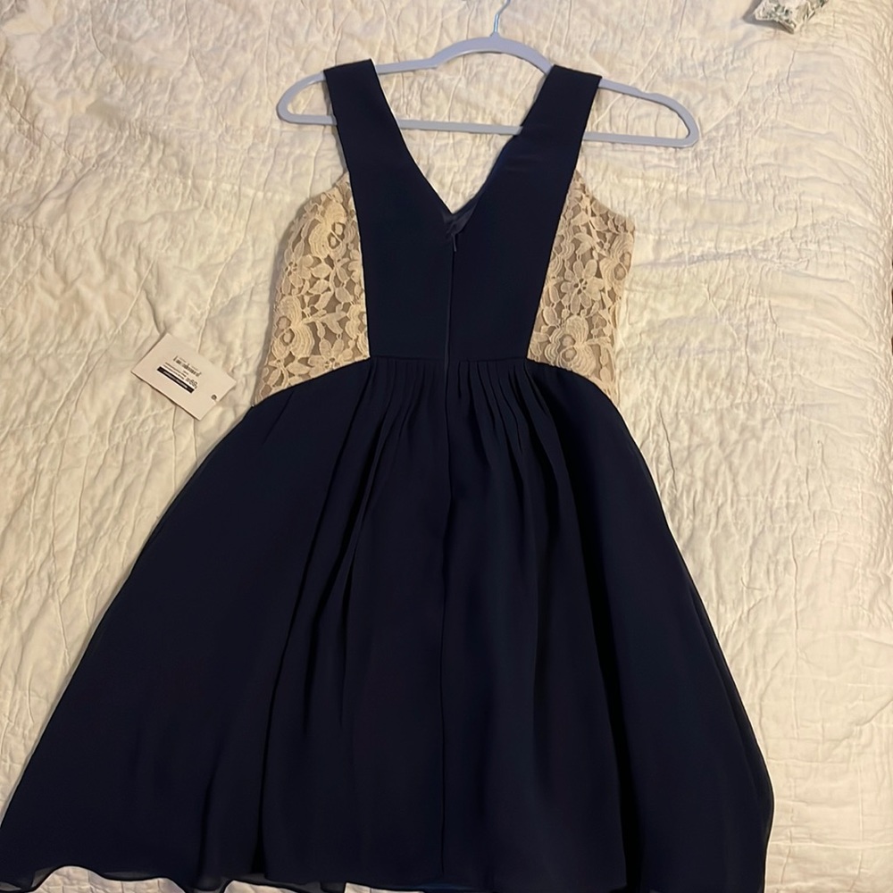 Navy and cream lace dress.